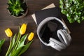 Audiobook concept modern wireless headphones smartphone book