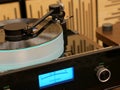 Audiophile turntable with vinyl record.