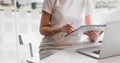 Audit working, Businesswoman work with paper document on clipping board in office