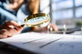 Auditor Using Magnifying Glass For Audit Royalty Free Stock Photo