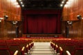 Auditorium with red chairs