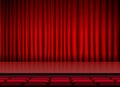 Auditorium stage theater with red curtains and seats Royalty Free Stock Photo