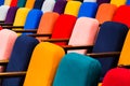 The auditorium in the theater. Multicolored spectator chairs Royalty Free Stock Photo