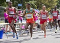 6 Aug `17 - London World Athletics Championships marathon: Bahrainian DECHASA passes water bottle to Ethiopian TSEGAY