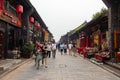 Aug 2013 - Pingyao, Shanxi, China - the streets of Pingyao Ancient city at sunset crowded with tourists.