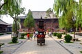 Aug 2013 - Pingyao, Shanxi, China - Tourists in the courtyard of Confucius temple in Pingyao