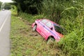 Aug 8, 2017 : Pink Toyota taxi with number place 5150 had road accident on the side of the road Royalty Free Stock Photo