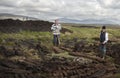 Two man turning turf in Ireland.