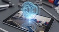 Augmented reality application showing a turbine design on a tablet surrounded by tools suggests modern engineering and technology Royalty Free Stock Photo