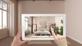 Augmented reality concept. Hand holding tablet with AR application used to simulate furniture and design products in empty