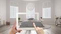 Augmented reality concept. Hand holding tablet with AR application used to simulate furniture and interior design products in real Royalty Free Stock Photo