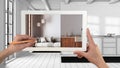 Augmented reality concept. Hand holding tablet with AR application used to simulate furniture products in custom architecture