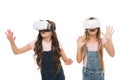 Augmented reality technology. Virtual reality is exciting. Girls little kids wear vr glasses white background. Virtual Royalty Free Stock Photo