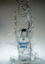 12 Augsut 2020, Yogyakarta, Indonesia: Vodka bottle water splash with iced cube properties Royalty Free Stock Photo