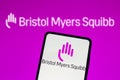 August 16, 2022, Brazil. In this photo illustration, the Bristol-Myers Squibb BMS logo is displayed on a smartphone screen and Royalty Free Stock Photo