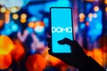 August 22, 2022, Brazil. In this photo illustration, the Domo, Inc. logo is displayed on a smartphone screen