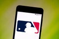 August 2, 2019, Brazil. In this photo illustration the Major League Basebal MLB logo is displayed on a smartphone Royalty Free Stock Photo