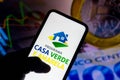 August 5, 2021, Brazil. In this photo illustration the Programa Casa Verde e Amarela logo seen displayed on a smartphone