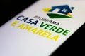 August 5, 2021, Brazil. In this photo illustration the Programa Casa Verde e Amarela logo seen displayed on a smartphone