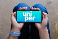 August 7, 2023, Brazil. In this photo illustration, the Uniper logo seen displayed on a smartphone