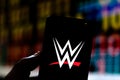 August 2, 2019, Brazil. In this photo illustration the World Wrestling Entertainment WWE logo is displayed on a smartphone