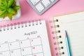 August 2021 calendar with note book o Royalty Free Stock Photo