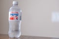 August 23 2022 - Calgary Alberta Canada - Cold Bottle of crystal Pepsi