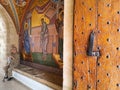 August 2018 - Cyprus: Entrance to the Greek orthodox Kykkos monastery with beautiful mosaic art depicting religious stories