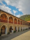 August 2018 - Cyprus: Gorgeous building in the Greek orthodox Kykkos monastery with multiple archways that are covered in mosaic