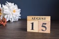 August 15, Date cover design with calendar cube.