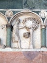 August, detail of the bass-relief representing the Labor of the months of the year, Cathedral in Lucca, Italy