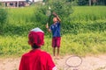 August 26, 2014 - Kids playing badminton in Sauraha, Nepal Royalty Free Stock Photo