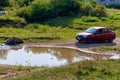 August 22, 2021 Koban Moldova, the car crosses a huge stream or a small river. Illustrative editorial. Background