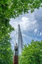 Sculpture Looking at Shard Tower in London