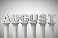 August month sign on a classic columns