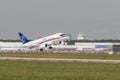 30 AUGUST 2019 MOSCOW, RUSSIA: A big white passenger plane taking off the runway - SUKHOI SUPERJET100 Royalty Free Stock Photo