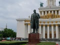 30 of August 2020 - Moscow, Russia: Lenin monument and main pavilion at All-Russian Exhibition Center Royalty Free Stock Photo