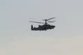 29 AUGUST 2019 MOSCOW, RUSSIA: A military dark helicopter with two pair of blades flying in the sky
