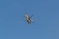 29 AUGUST 2019 MOSCOW, RUSSIA: A military helicopter with two pair of blades flying in the blue sky