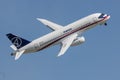 30 AUGUST 2019 MOSCOW, RUSSIA: A passenger plane flying in the sky - SUKHOI SUPERJET100 Royalty Free Stock Photo