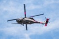 August 13, 2020 Mountain View / CA / USA -  Military helicopter with pink markings in mid flight; California National Guard HH-60 Royalty Free Stock Photo