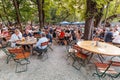 People resting and drinking in beer garden Royalty Free Stock Photo