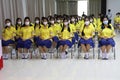 August 1, 2023, Nakhon Sawan, Thailand. Young student girls wearing face masks sit in the conference room in the morning.