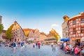 Tourists relax in restaurants and taverns on the beautiful square in Nuremberg`s old town
