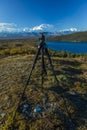 AUGUST 28, 2016 - Photographer Joe Sohm poses at famous Ansel Adams picture spot, Wonder Lake, Mount Denali, Kantishna, Alaska