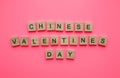 QiXi Festival, Double Seven Festival, Chinese Valentines Day, minimalistic banner with wooden letters on a red