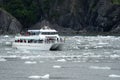 AUGUST 4 2018 - SEWARD AK: Tourist boat in Kenai Fjords National Park gets close to the beautiful scenery and icebergs