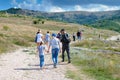 August 25, 2021. Simferopol district, republic of Crimea. The excursion group goes on a hike to the valley of the Red Caves