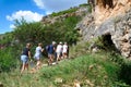 August 25, 2021 Simferopol district, Valley of Red Caves. Republic of Crimea. Hike of the excursion group to the mountains to the Royalty Free Stock Photo