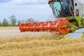 22 August 2021 Skutec, Czech Republic: Combine harvester harvests wheat close-up. Work in the field.